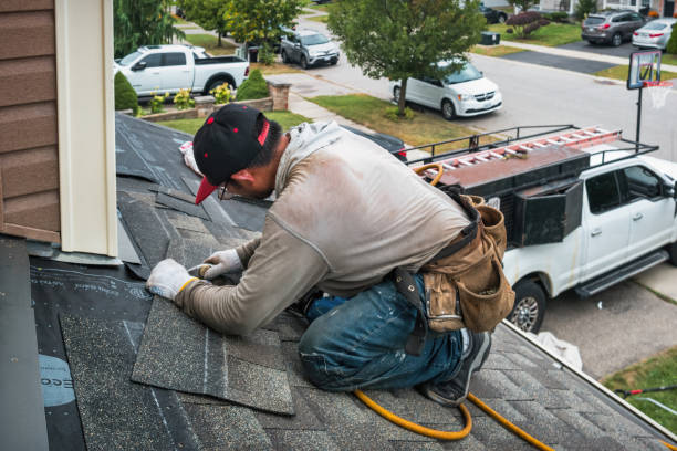 Professional Emergency Roof Repair technician working in Schodack Landing, NY